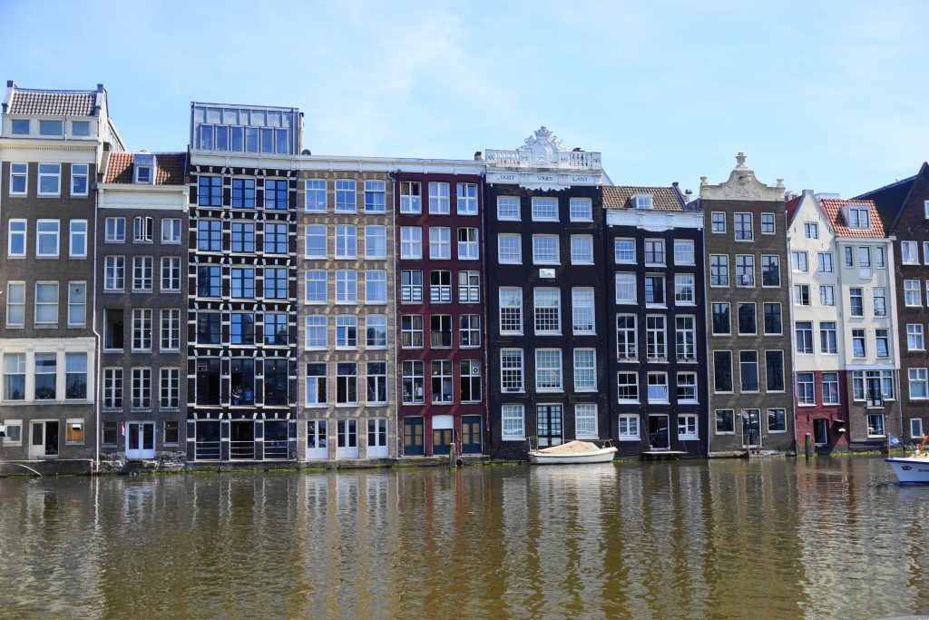 Traditional tall houses of Amsterdam as seen from Amsterdam's canals