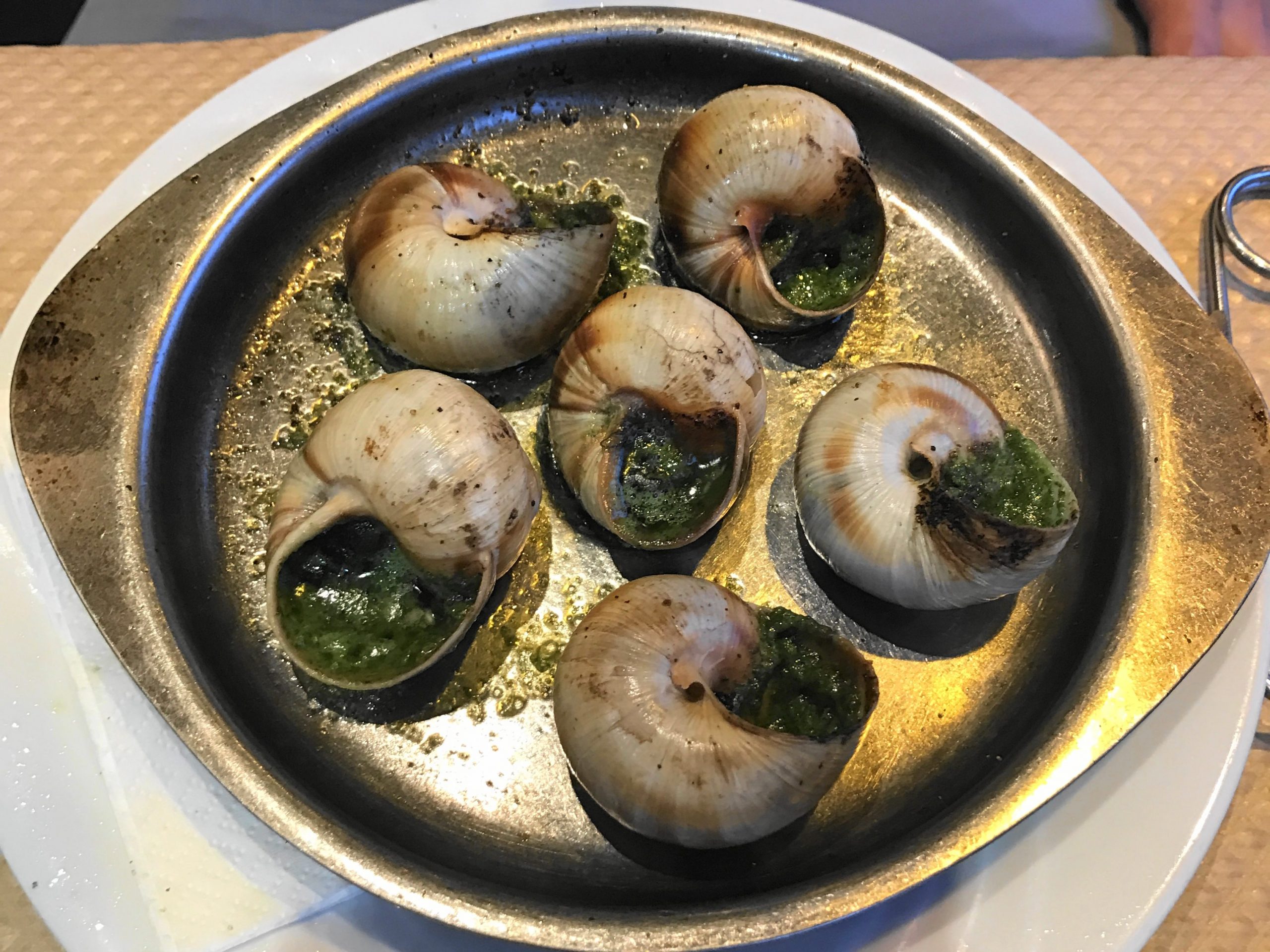 plate of escargot with garlic